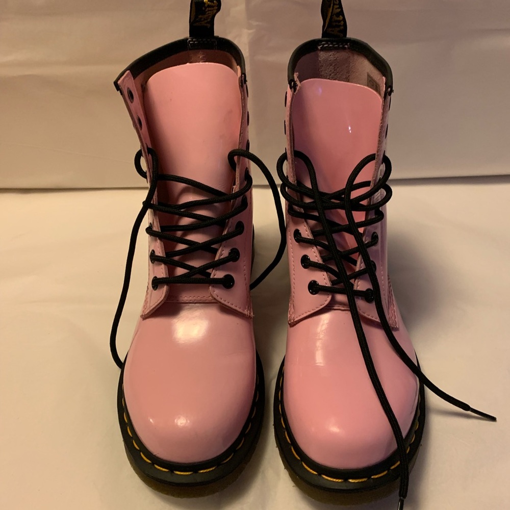 Women’s pink Dr. Martens 1460 boots